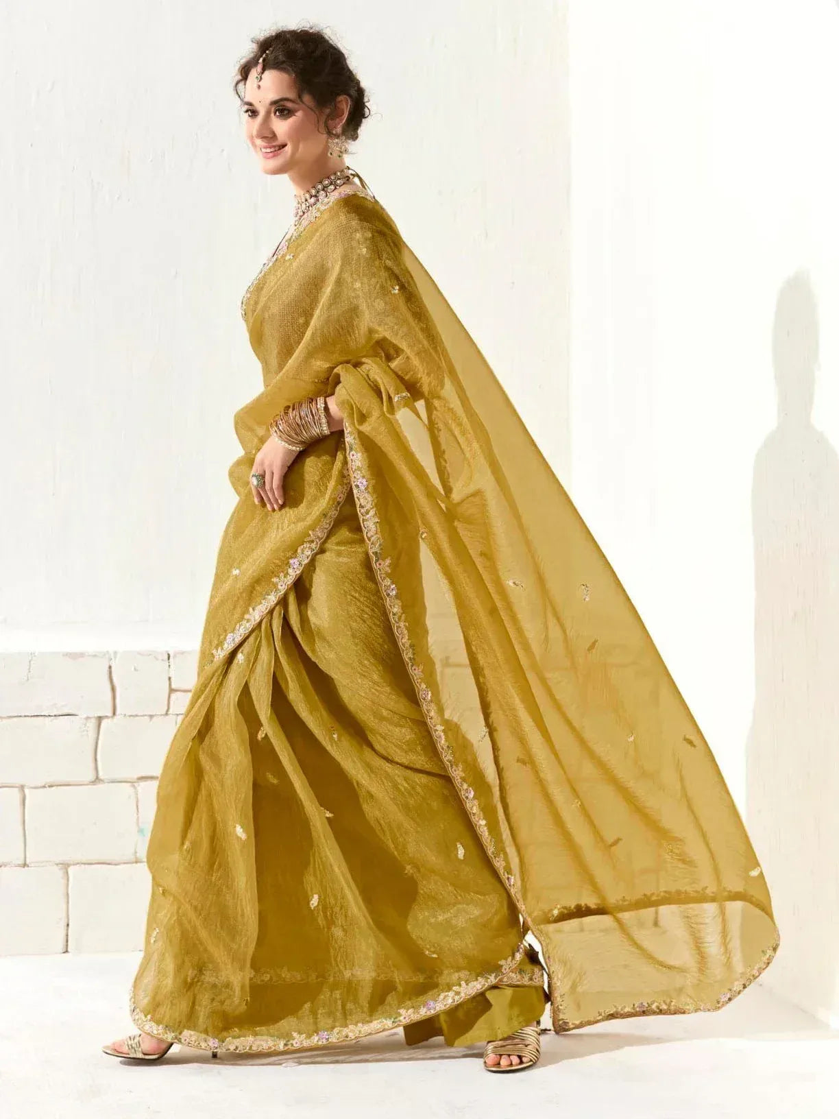 Elegant mustard yellow saree with floral embroidery and sheer dupatta, perfect for Indian ethnic occasions