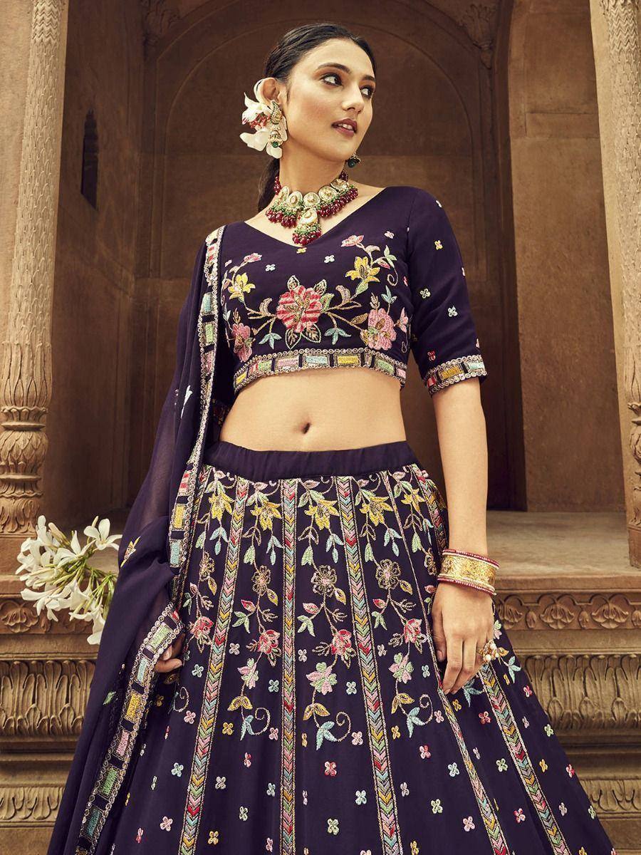 Purple embroidered lehenga choli with floral motifs, perfect for Indian ethnic wear occasions