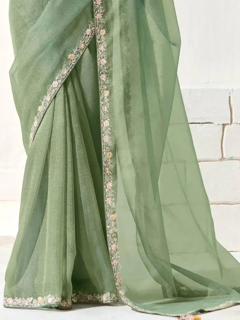 Fascinating Pista Green Border Work Tissue Silk Traditional Saree With Blouse