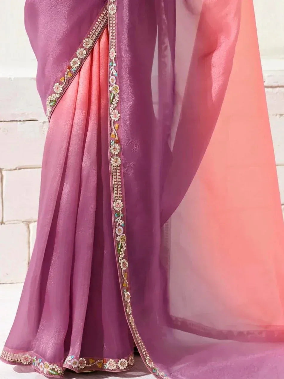 Pink and purple ethnic saree with floral embroidery, perfect for Indian occasions and festive wear.