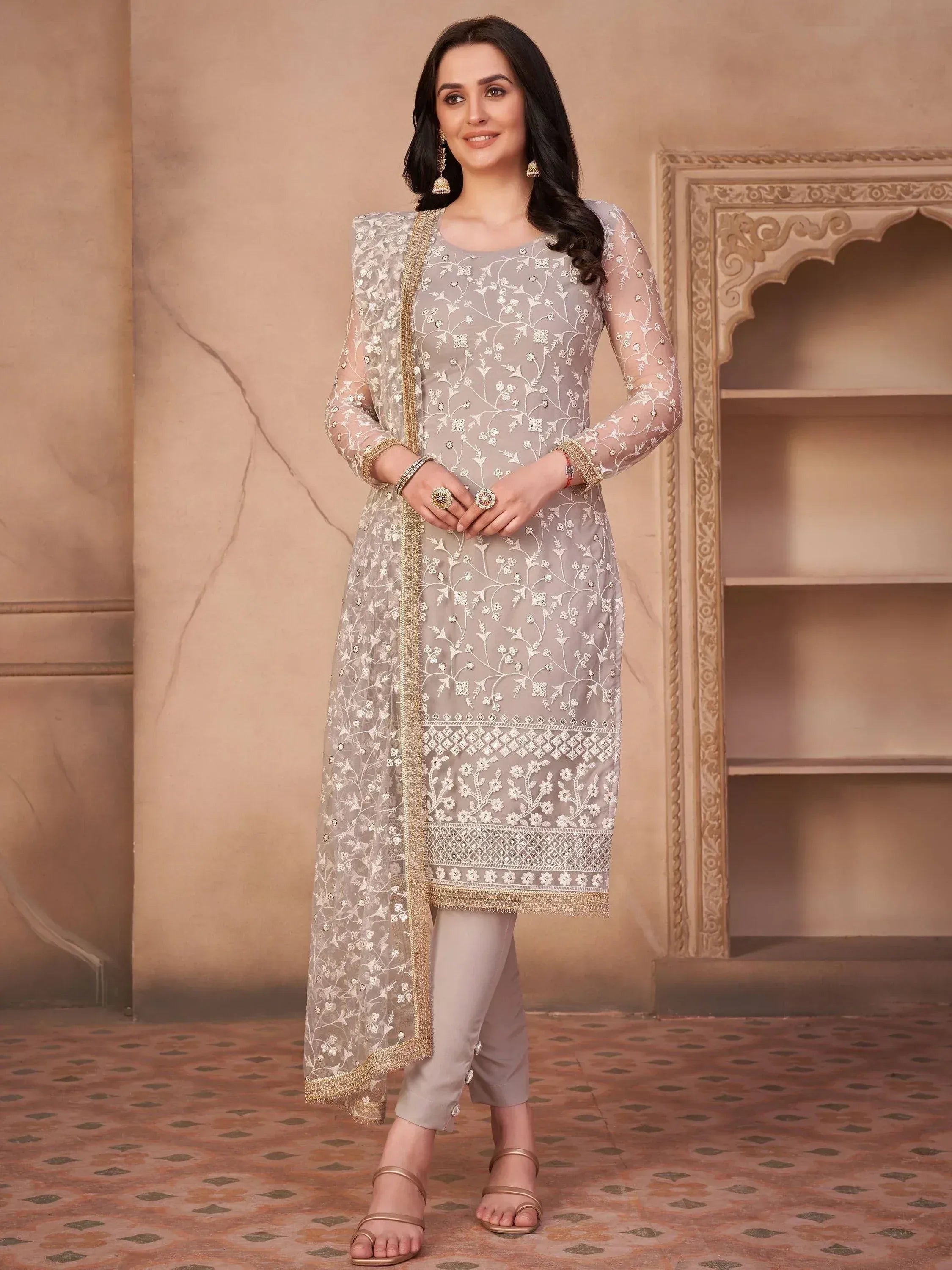 Elegant grey embroidered salwar kameez with sheer dupatta, perfect for Indian ethnic wear occasions
