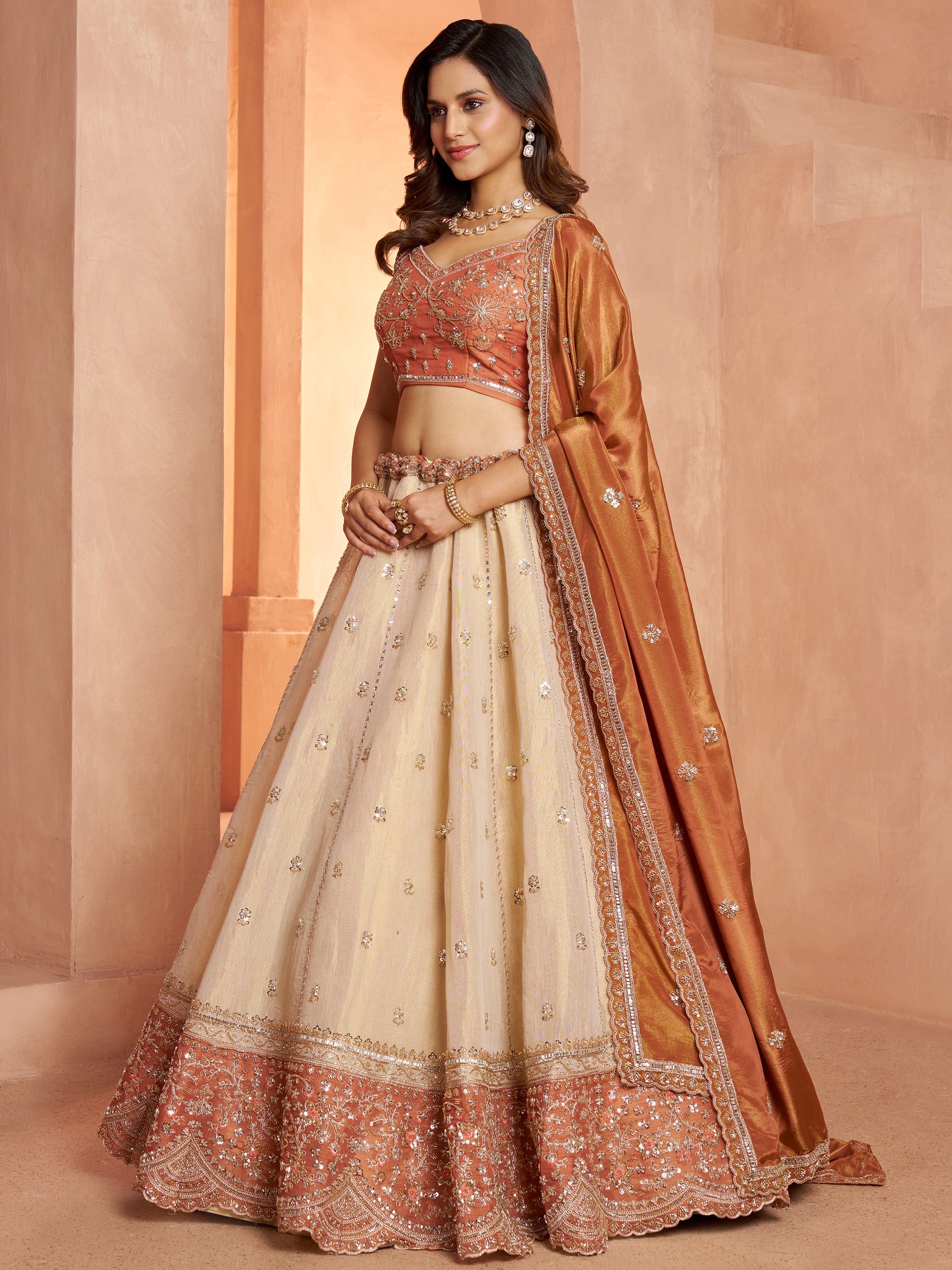 Magnificent Rust Embroidered Tissue Function Wear Lehenga Choli