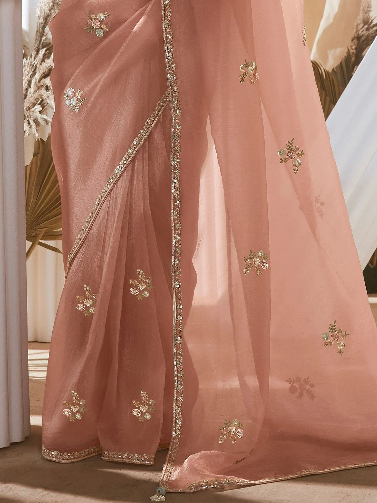 Dusty pink saree with floral embroidery and sequin border, elegant Indian ethnic wear