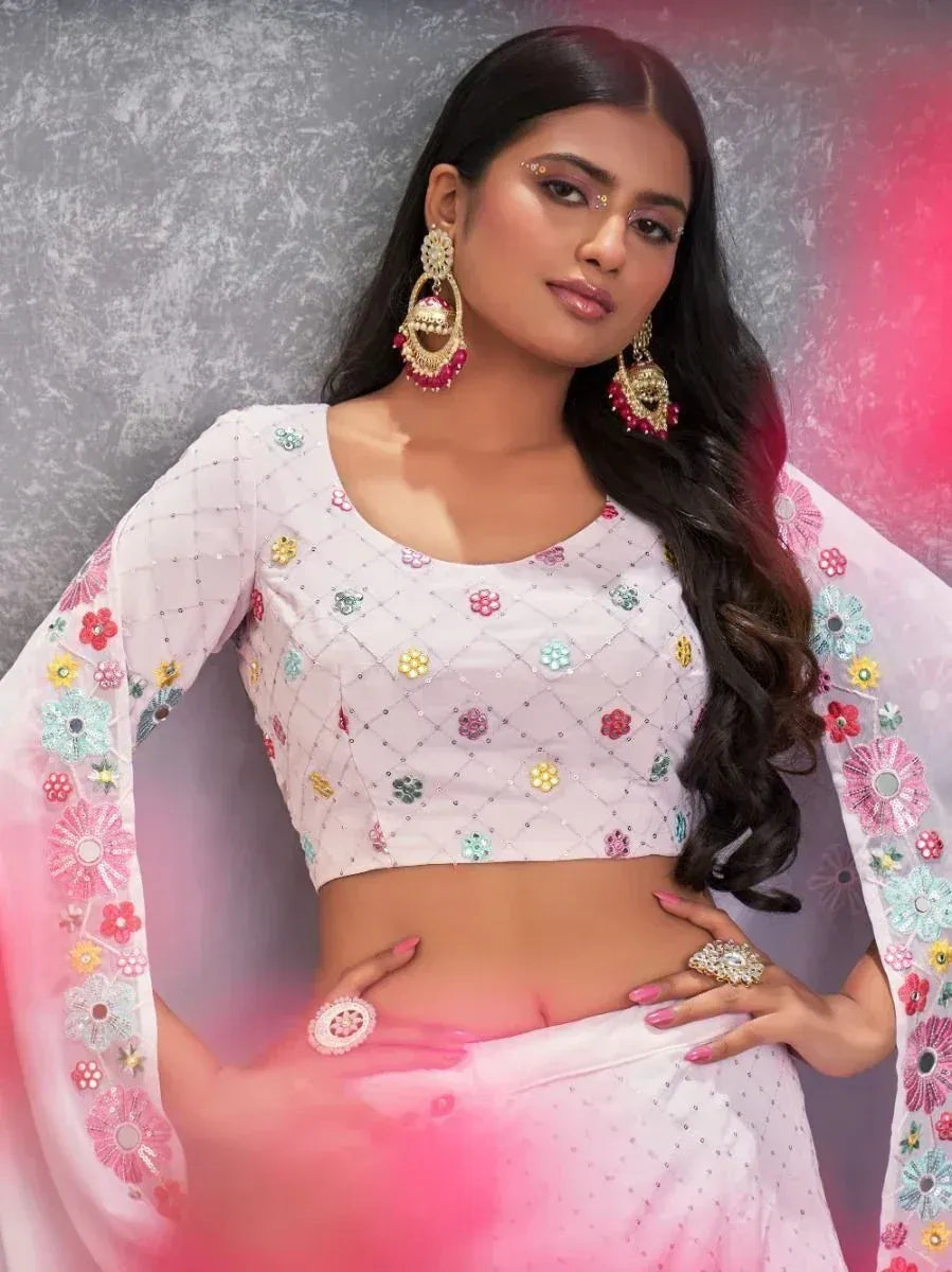Pink floral embroidered lehenga choli with mirror work, perfect for Indian ethnic wear occasions