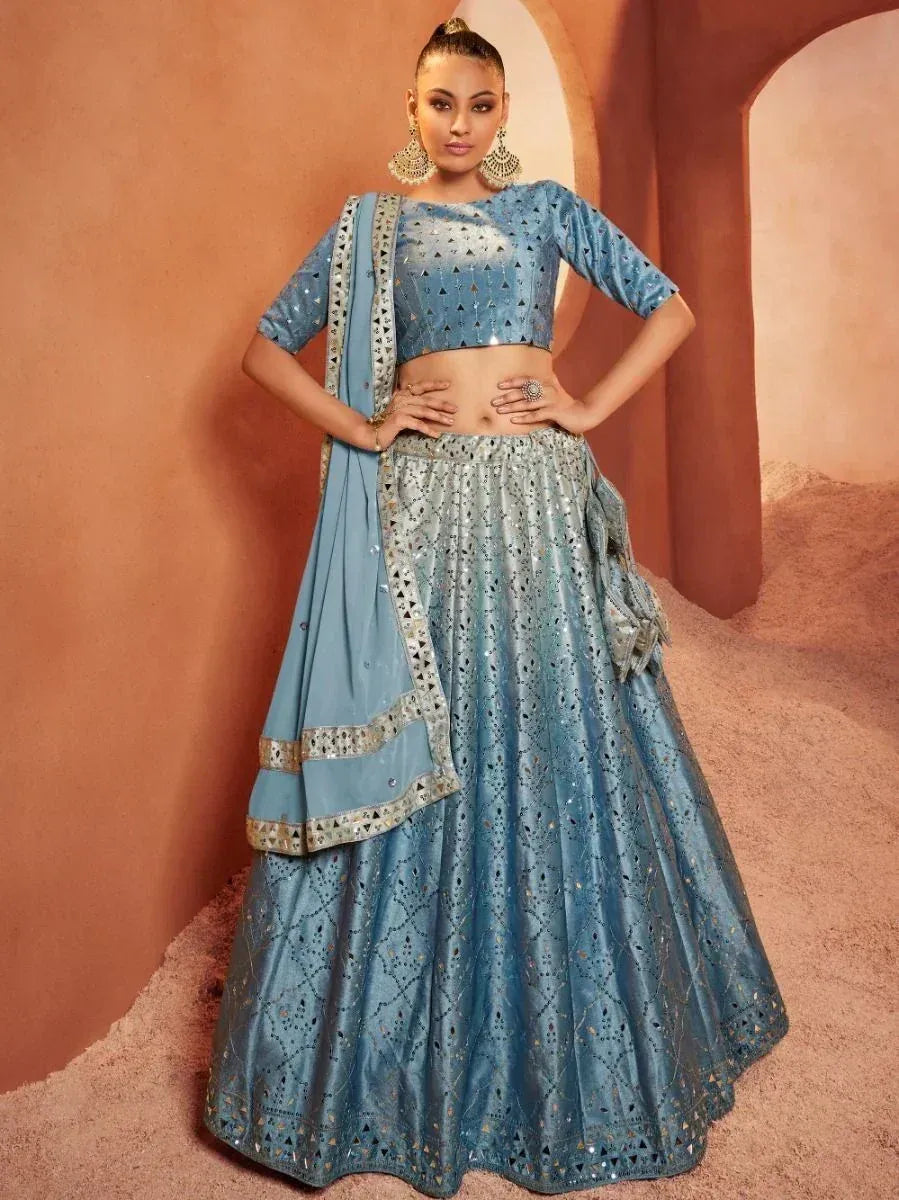 Blue designer lehenga choli with mirror work and dupatta, perfect for Indian ethnic occasions