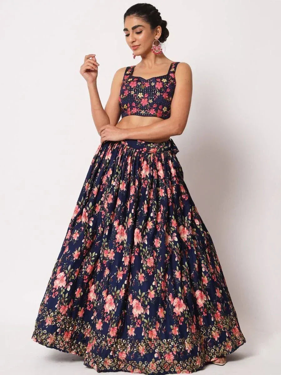 Navy blue floral lehenga choli with pink blooms, perfect for Indian ethnic wear occasions