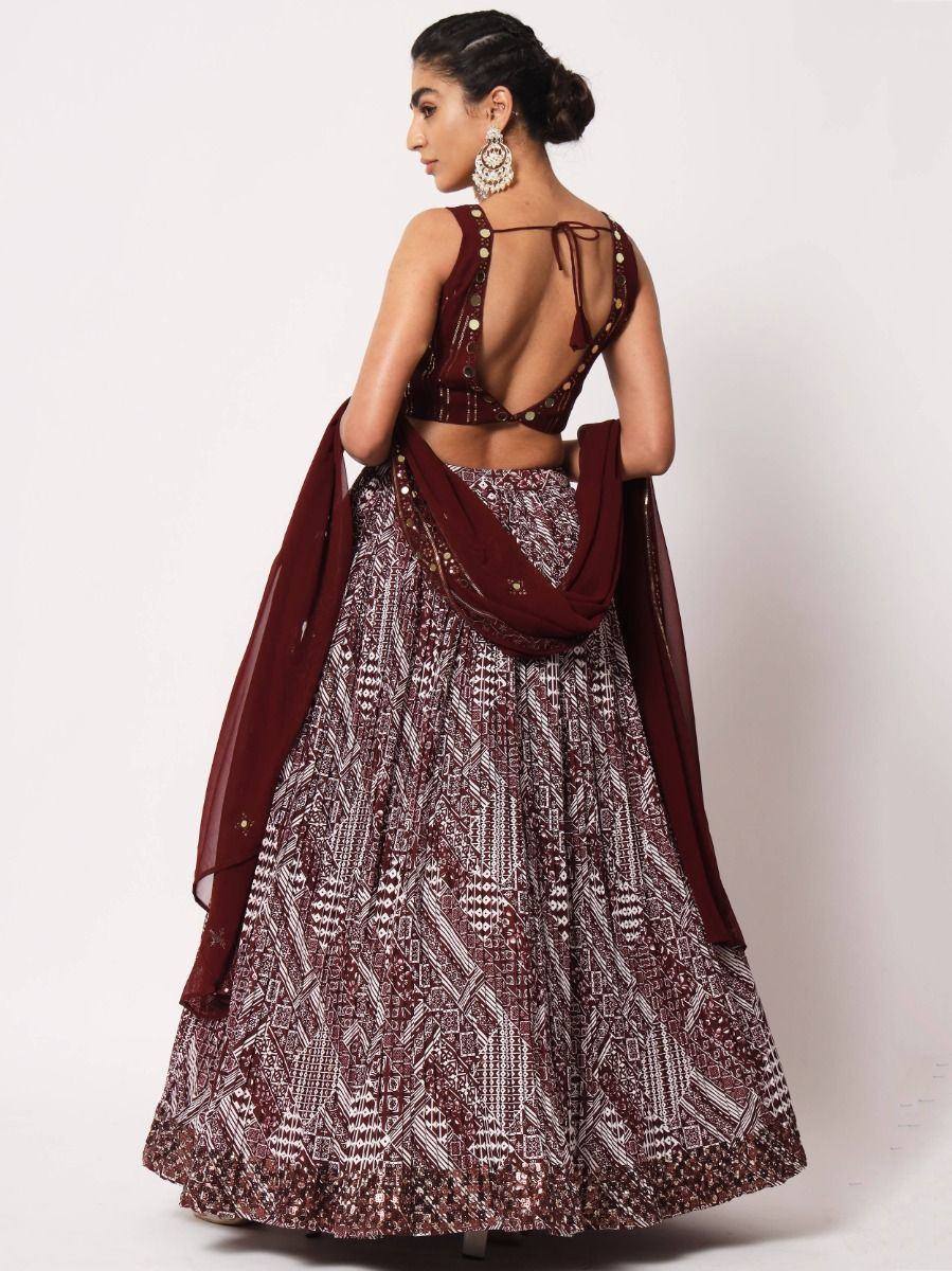 Maroon printed lehenga choli with backless blouse and dupatta, ethnic Indian wear