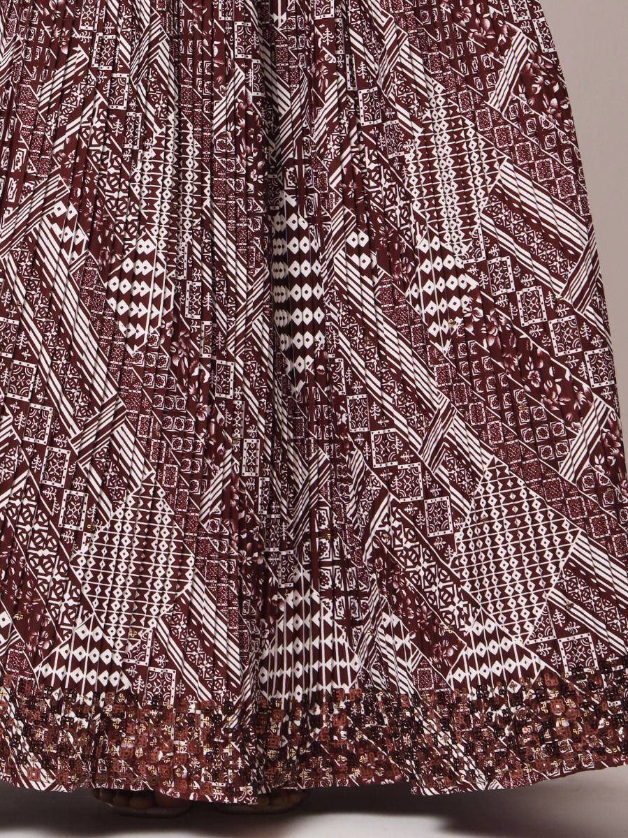 Maroon and white geometric print ethnic gown with pleated design and detailed hem