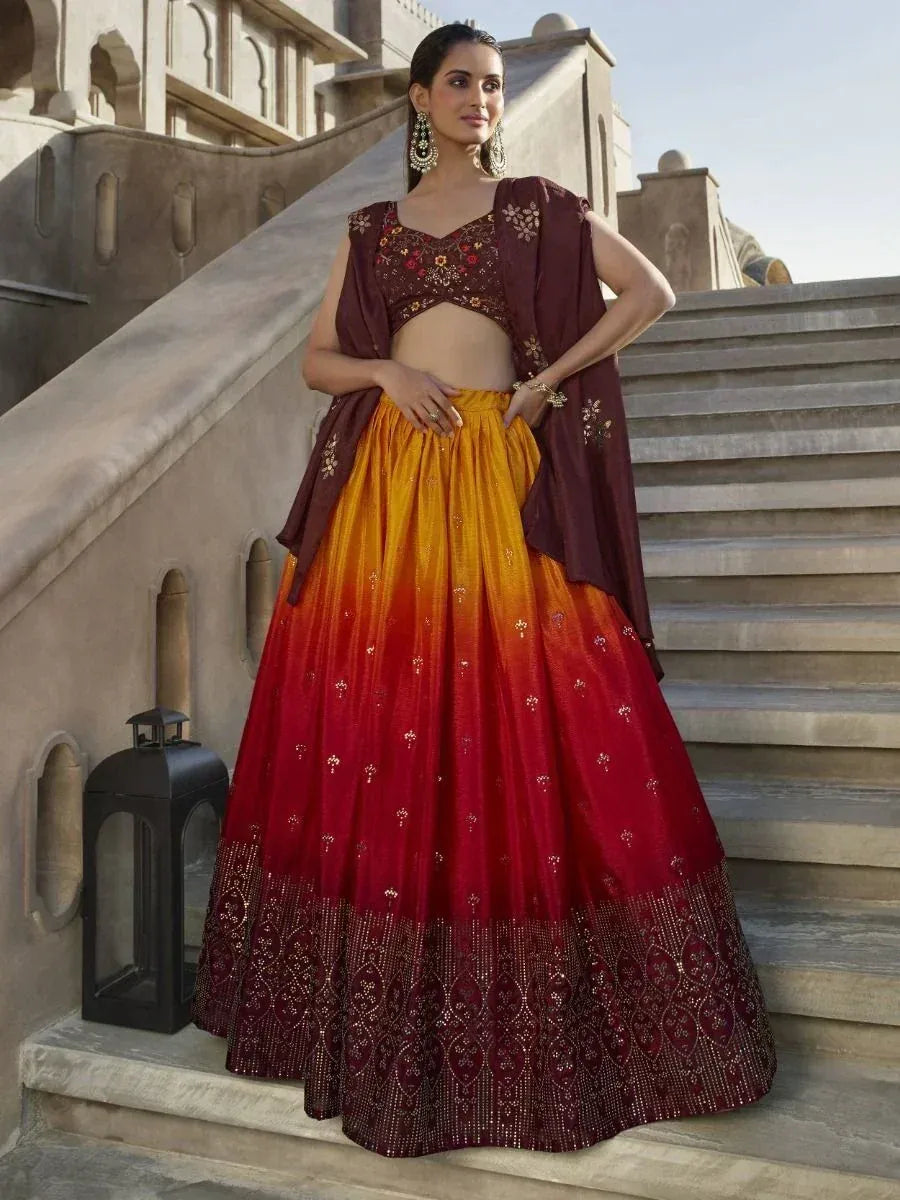 Maroon and ombre lehenga choli with floral embroidery, perfect for Indian weddings and festive occasions.