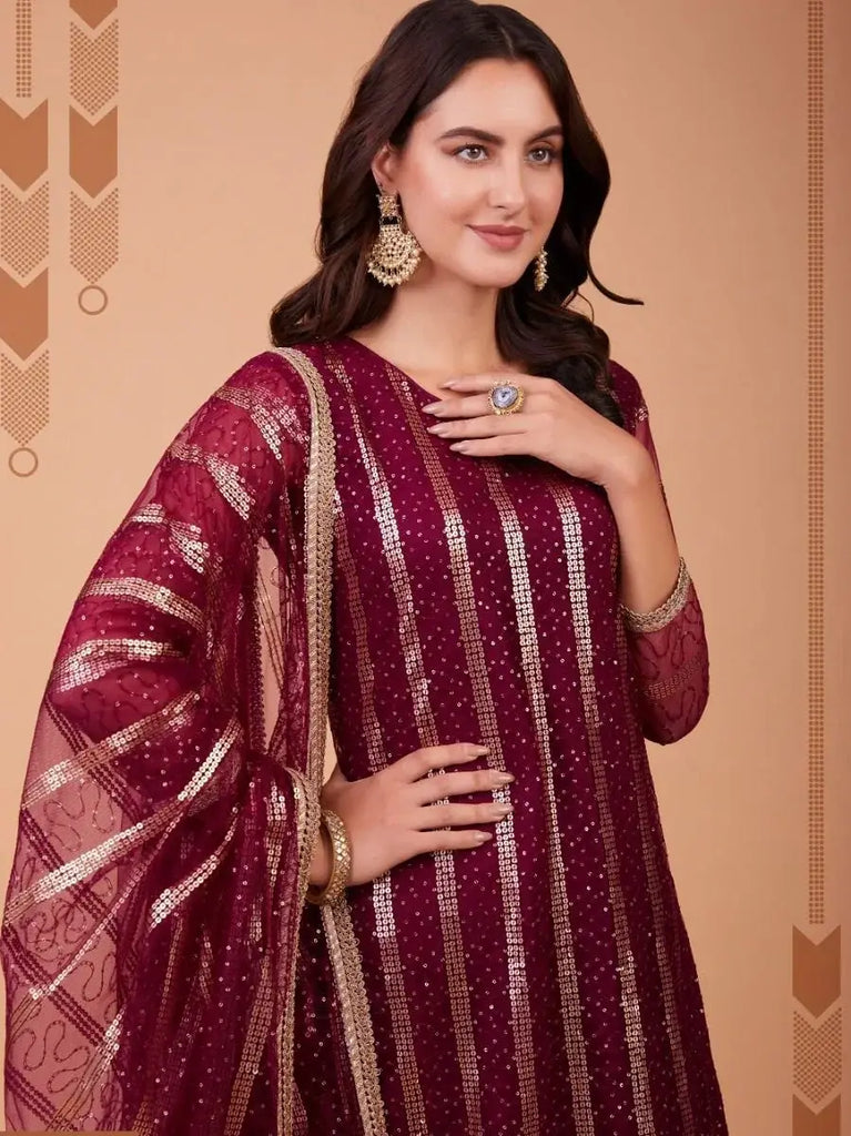 Ravishing Wine Sequence Embroidered Net Salwar Suit