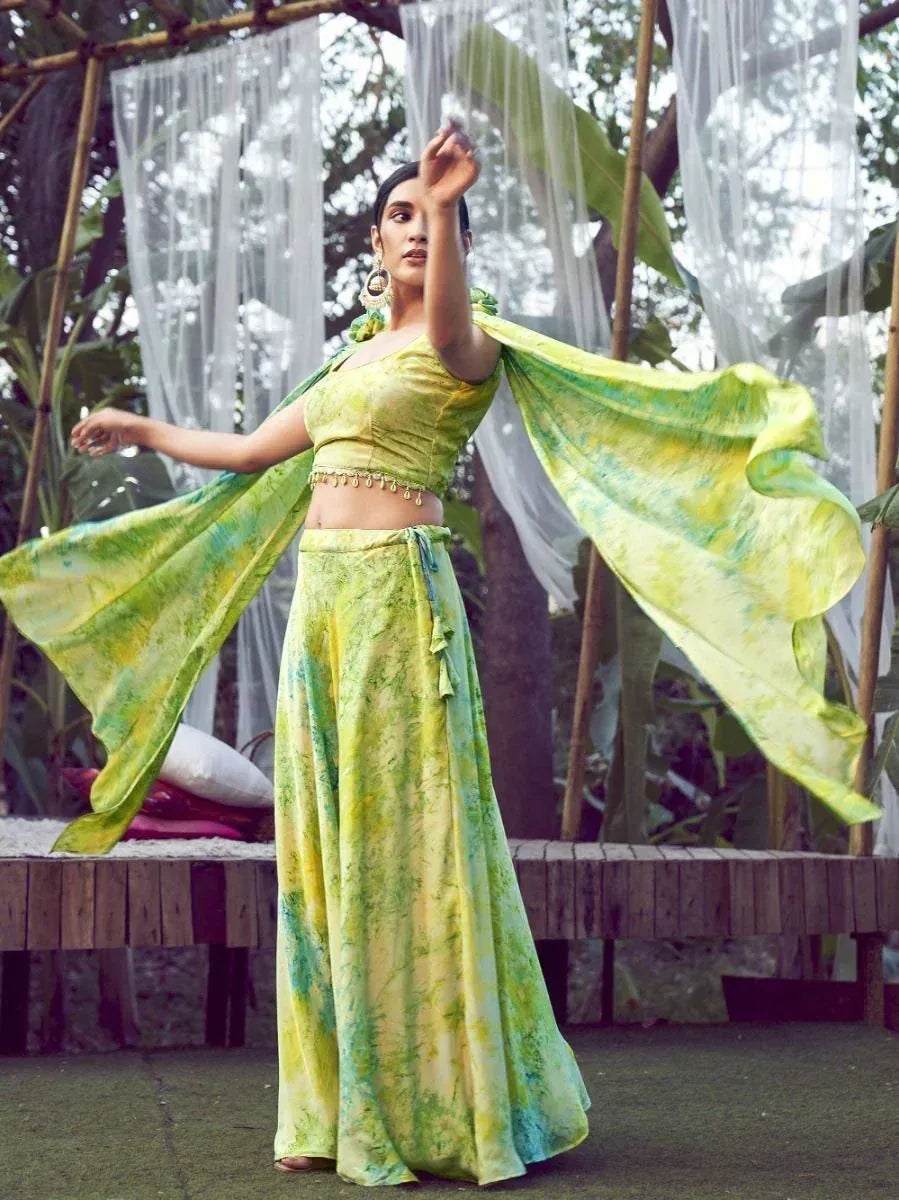 Green tie-dye ethnic gown with flowing cape, perfect for festive occasions and Indian wear
