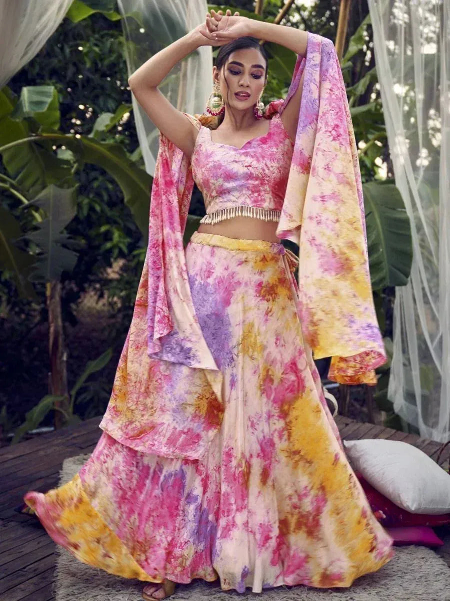 Vibrant tie-dye lehenga choli with floral print, perfect for Indian ethnic occasions