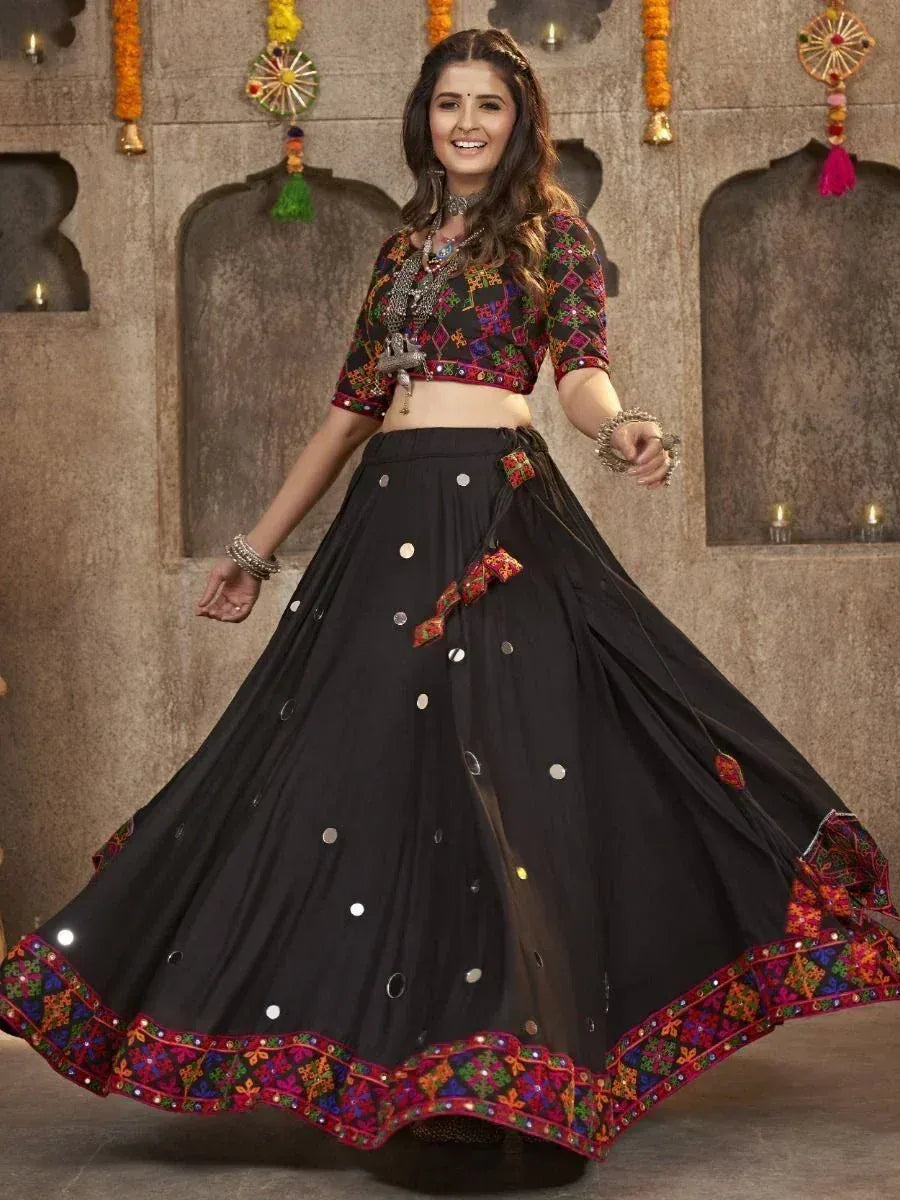 Black embroidered lehenga choli with mirror work, perfect for Indian ethnic wear and festive occasions.