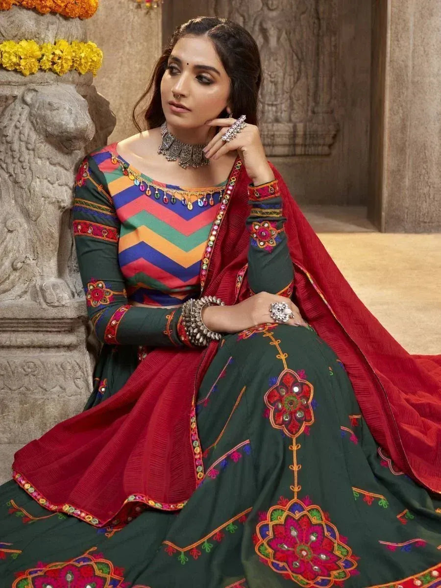 Colorful ethnic lehenga choli with chevron blouse, floral embroidery, and red dupatta for Indian occasions