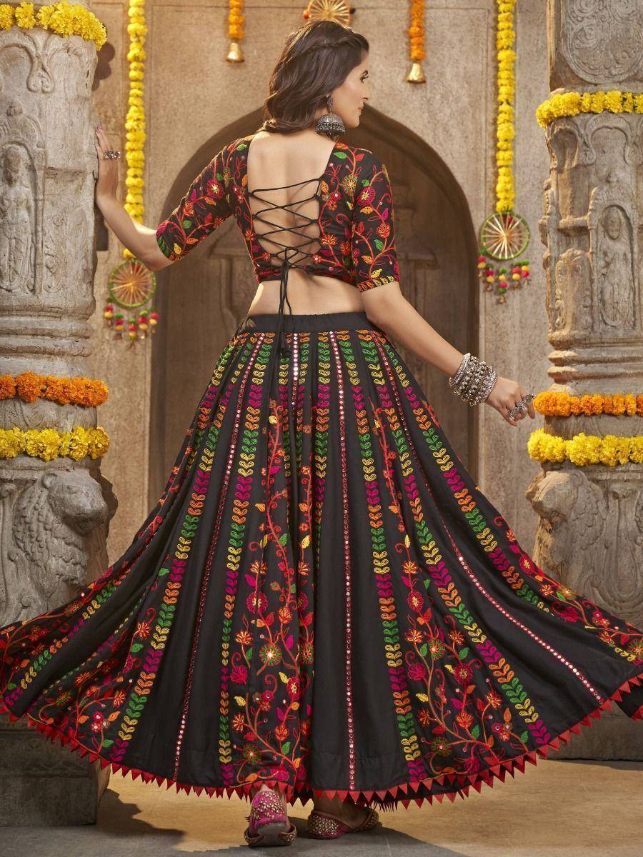 Black embroidered lehenga choli with colorful floral patterns, perfect for Indian ethnic wear occasions