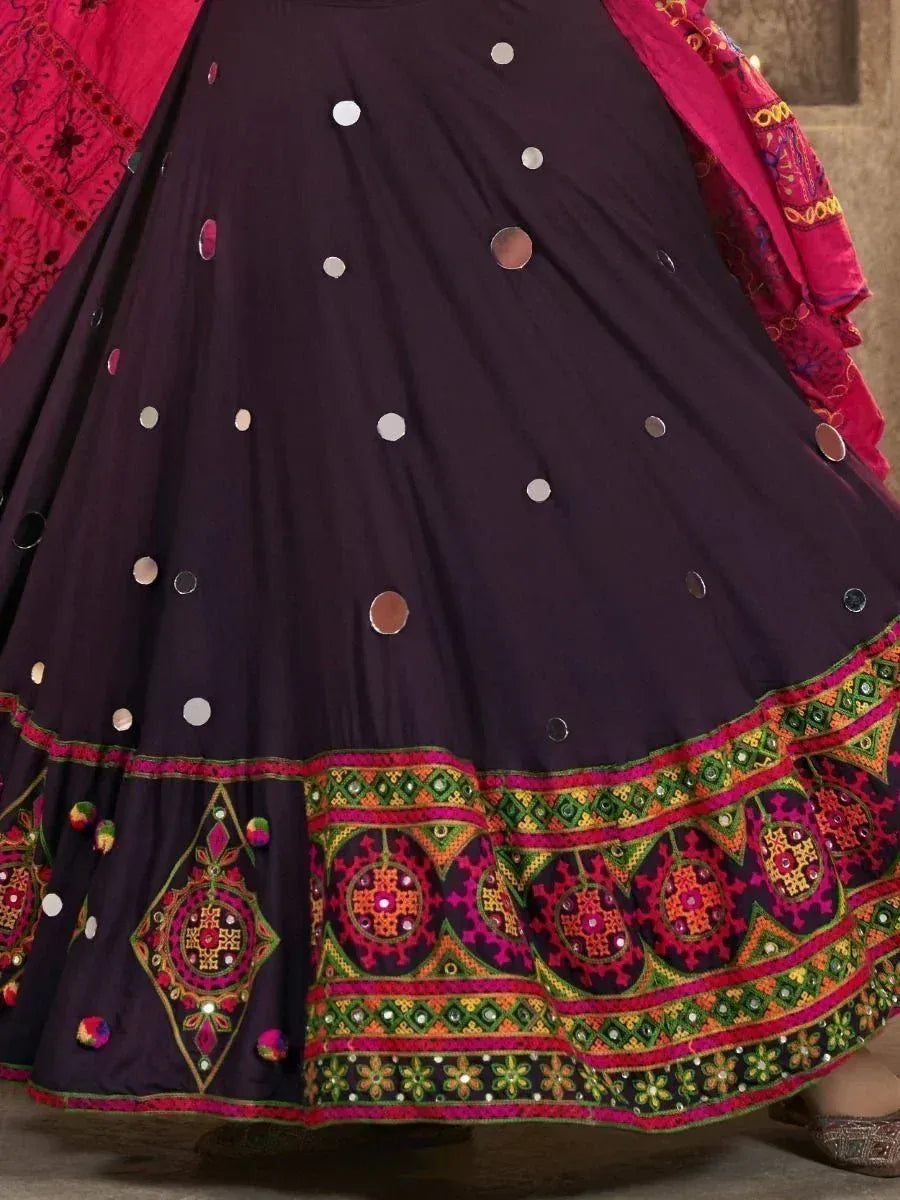 Purple ethnic lehenga with mirror work and colorful embroidery, paired with pink dupatta