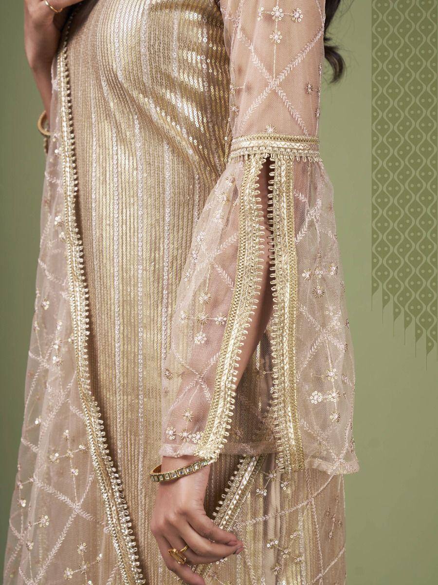 Gold sequin ethnic gown with sheer embroidered sleeves, perfect for Indian festive occasions