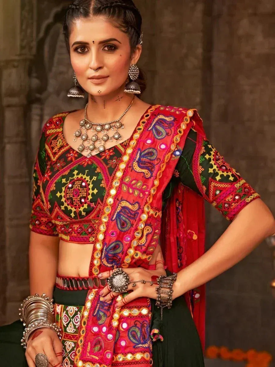 Vibrant Indian ethnic wear with mirror work, embroidered blouse and dupatta, traditional jewelry