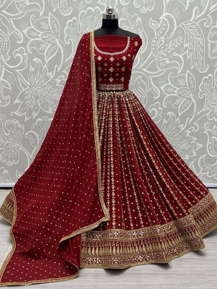 Maroon designer lehenga choli with gold embroidery and dupatta, ethnic Indian wedding wear
