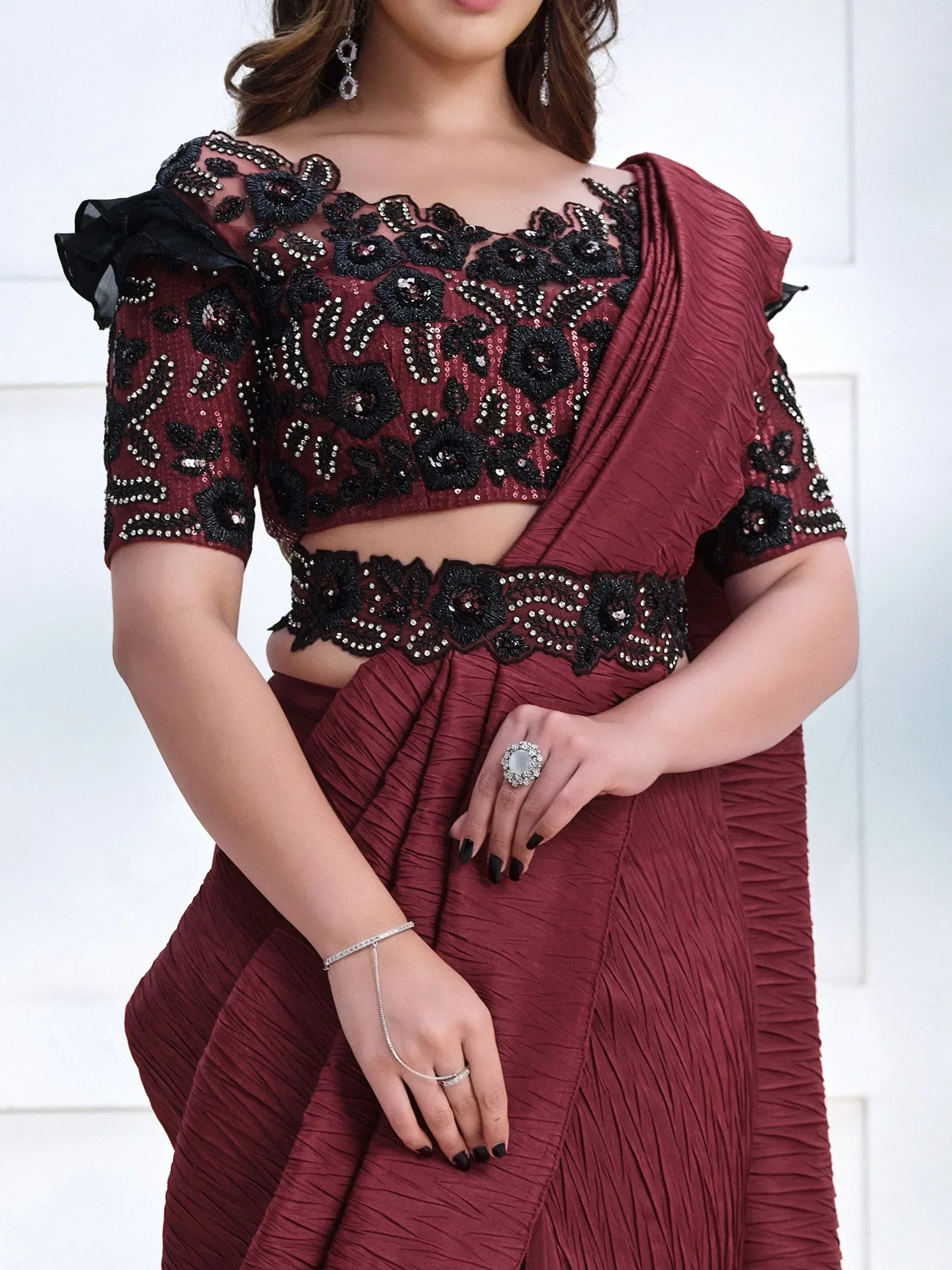 Maroon saree with black floral embroidery and sequins, off-shoulder blouse, ethnic wear