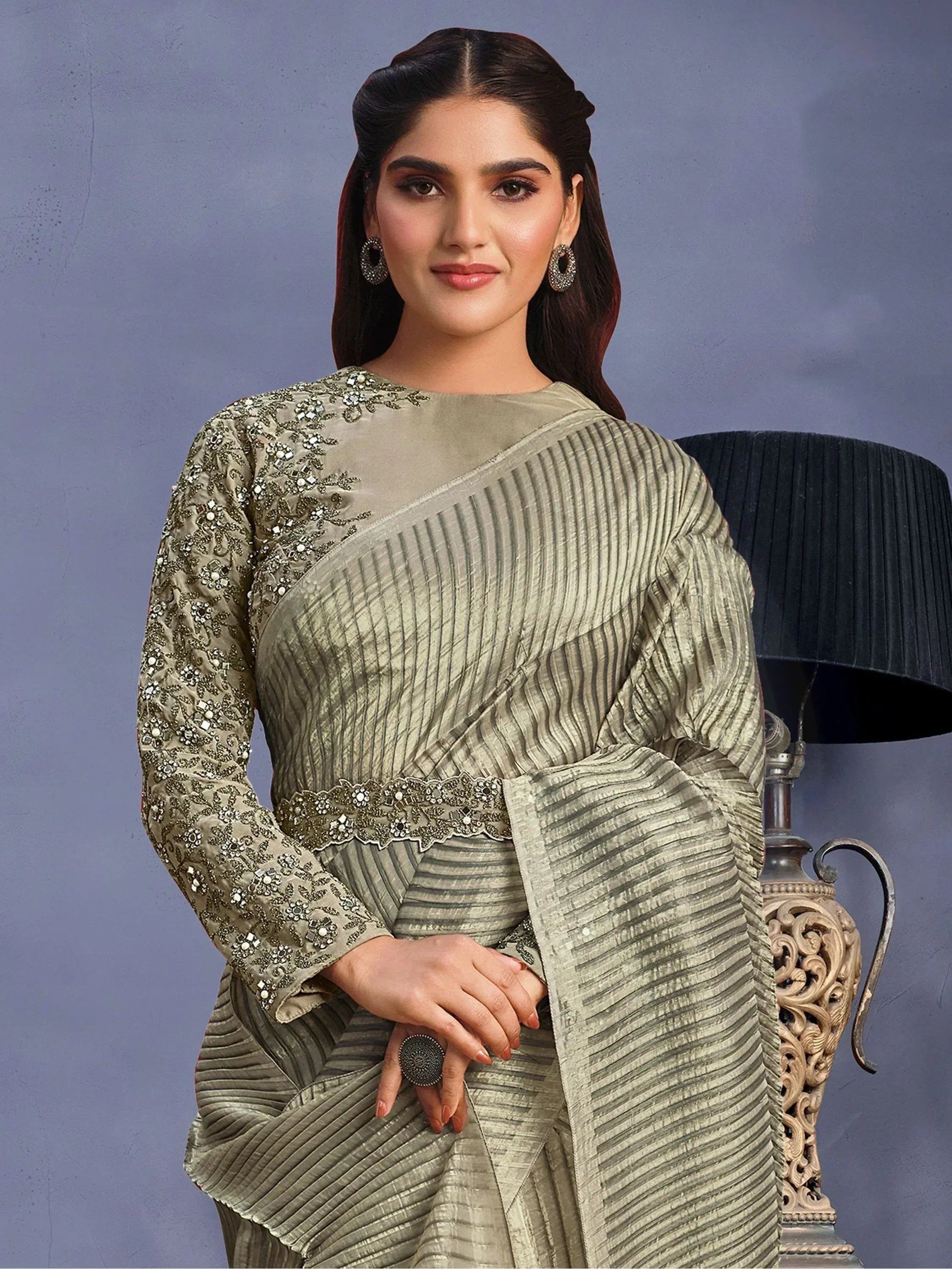 Olive green embroidered saree with pleated design, perfect for Indian ethnic wear occasions