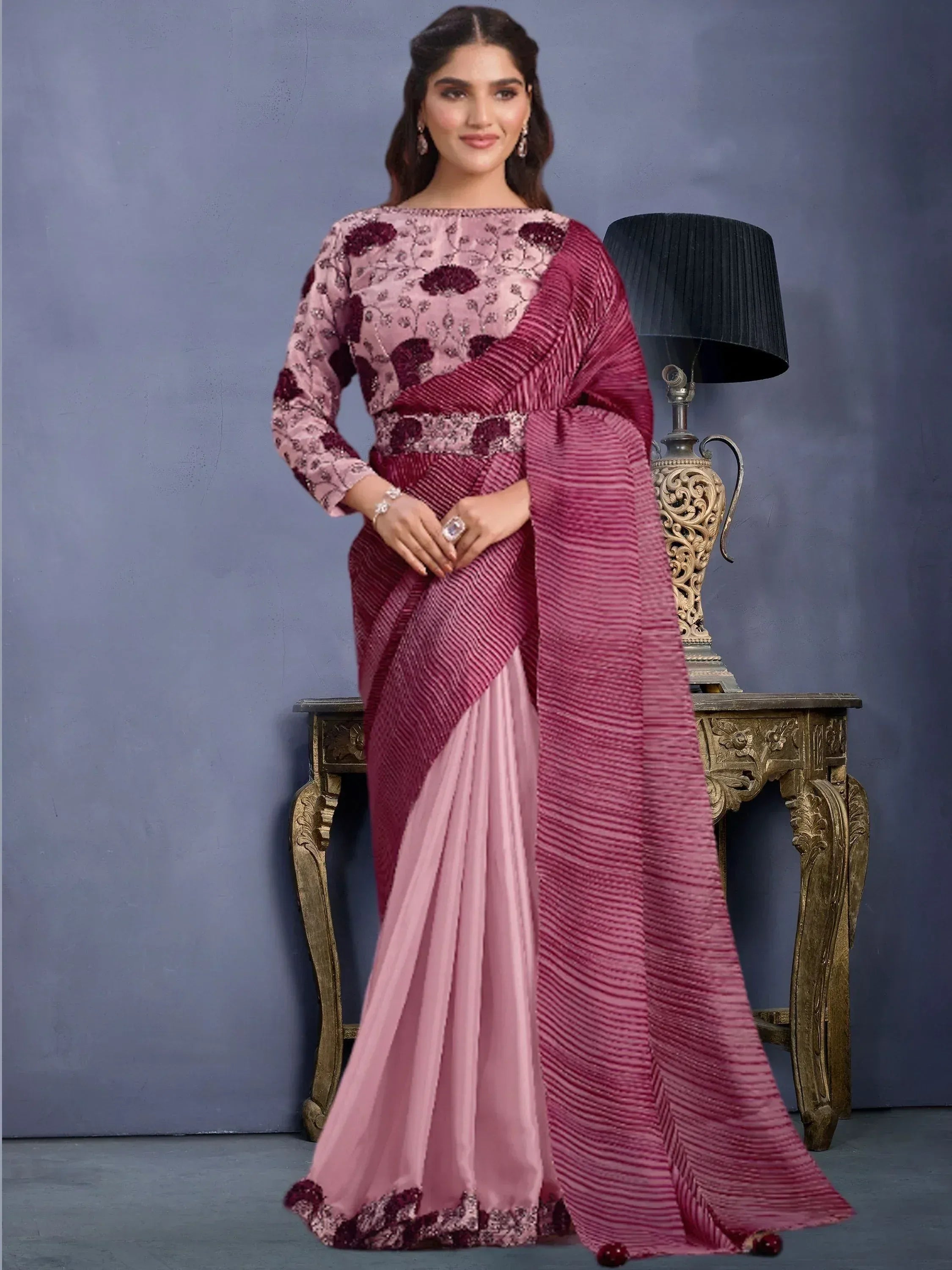 Elegant pink and maroon designer saree with floral embroidery and pleated detailing for Indian ethnic wear