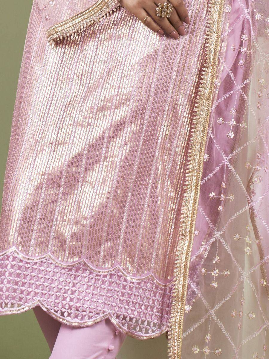 Pink sequin embroidered salwar kameez with gold trim and scalloped hem, perfect for ethnic occasions