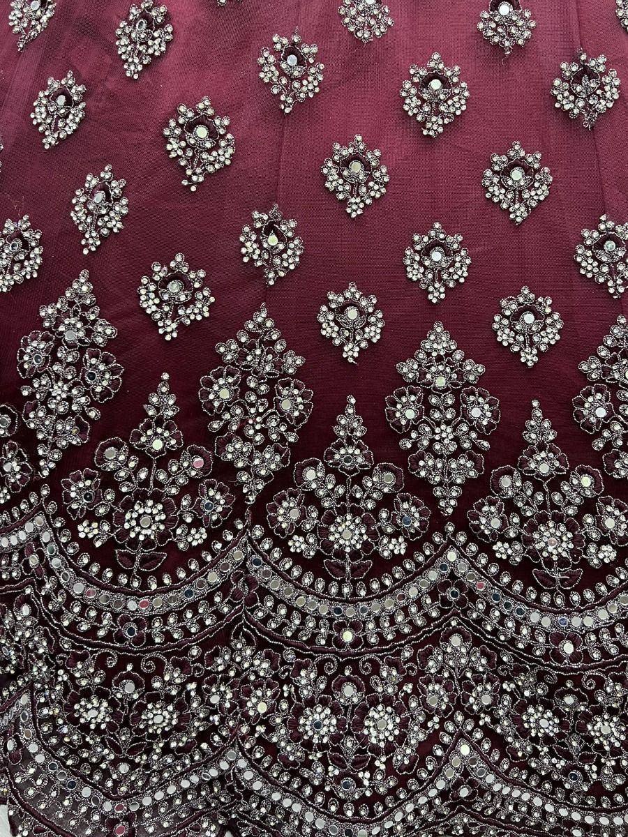 Maroon ethnic wear with intricate silver mirror and stone embroidery, perfect for Indian designer lehenga or saree