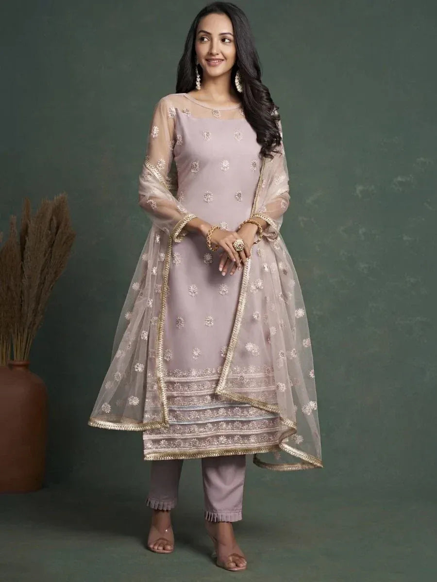 Elegant mauve embroidered salwar kameez with sheer dupatta, perfect for Indian ethnic occasions