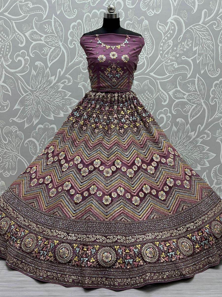 Spectacular Purple Embroidered Net Lehenga Choli With Dupatta