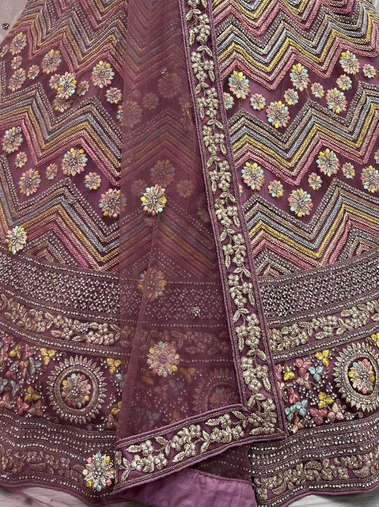 Spectacular Purple Embroidered Net Lehenga Choli With Dupatta