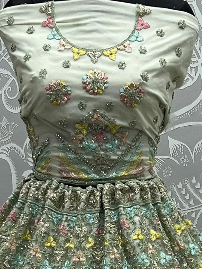 Pleasant Pastel Green Embroidered Net Lehenga Choli With Dupatta