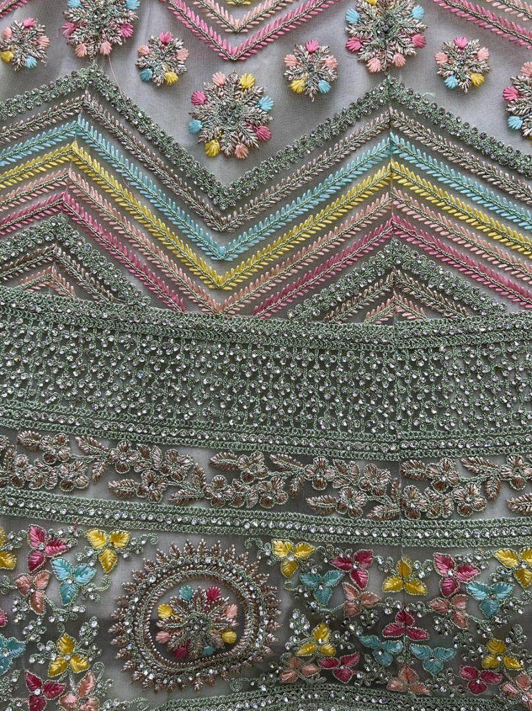 Pleasant Pastel Green Embroidered Net Lehenga Choli With Dupatta