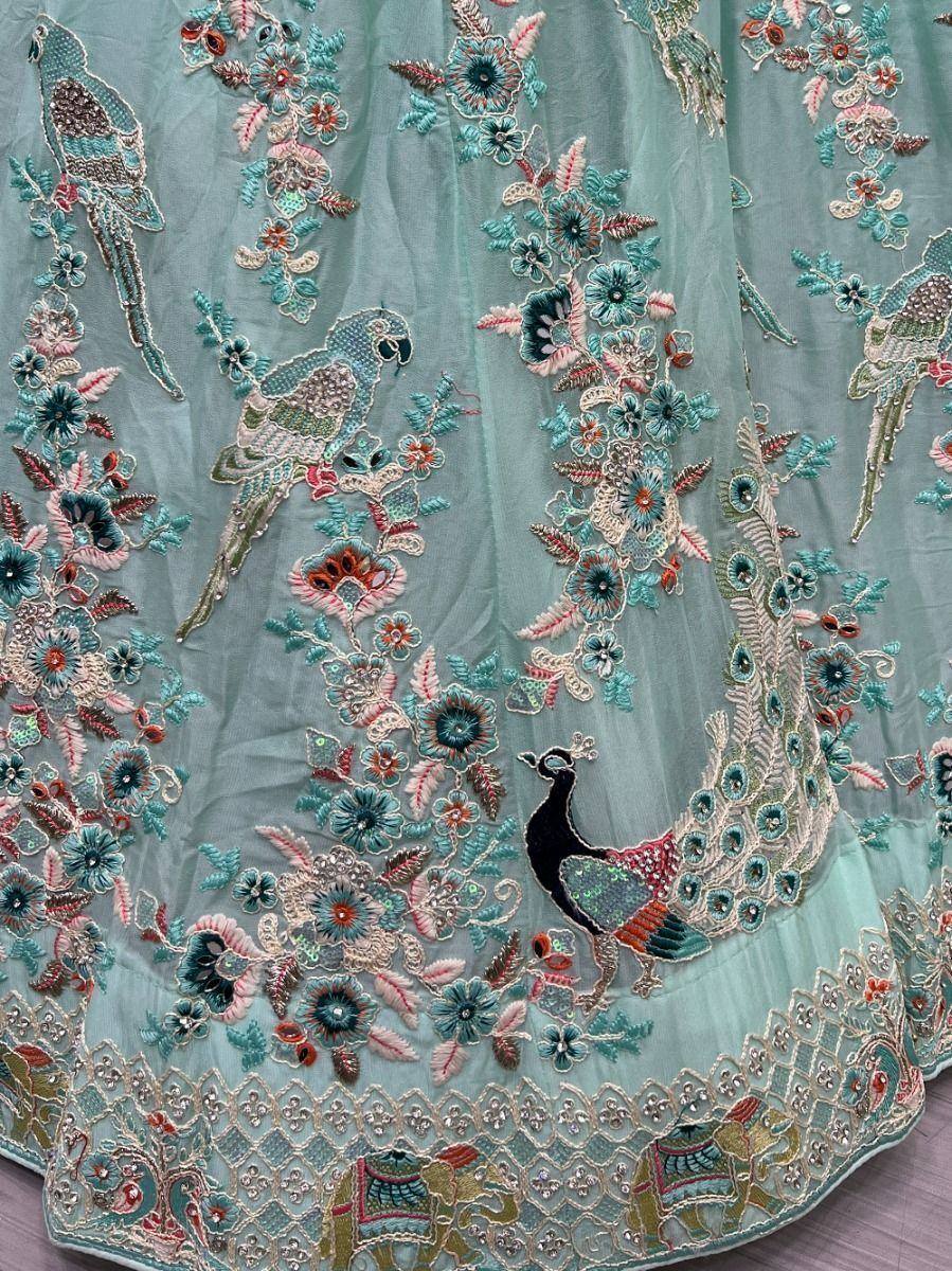 Mint green lehenga with peacock and floral embroidery, perfect for Indian ethnic wear