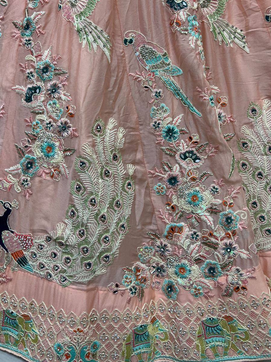 Pink lehenga with peacock, floral, and elephant embroidery for Indian ethnic wear