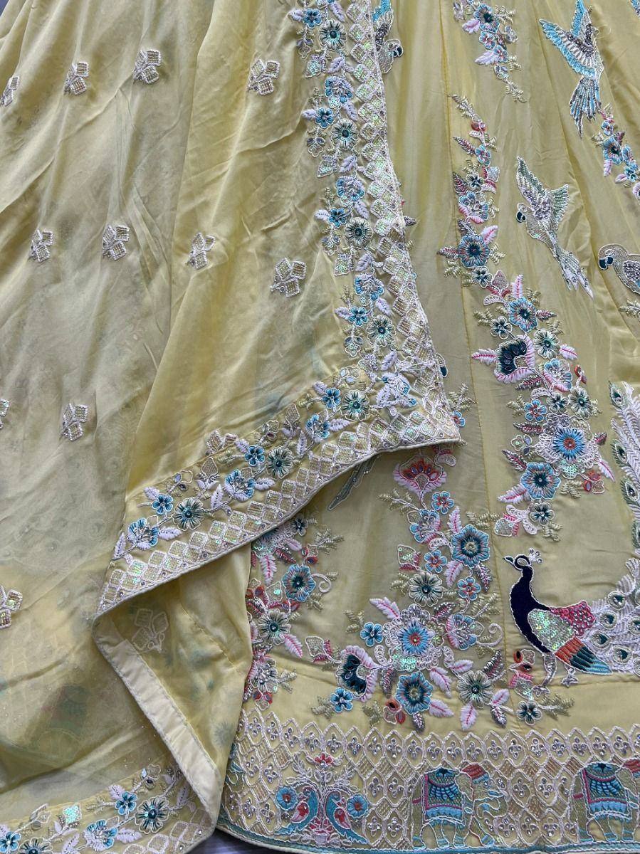 Yellow designer lehenga with peacock and floral embroidery, ethnic wear for women