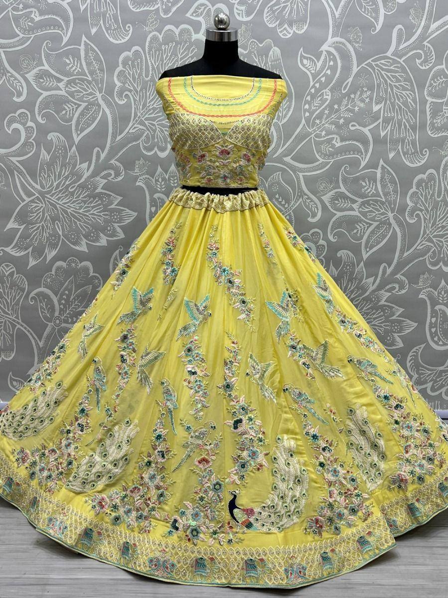 Yellow designer lehenga choli with peacock embroidery, perfect for Indian ethnic wear occasions