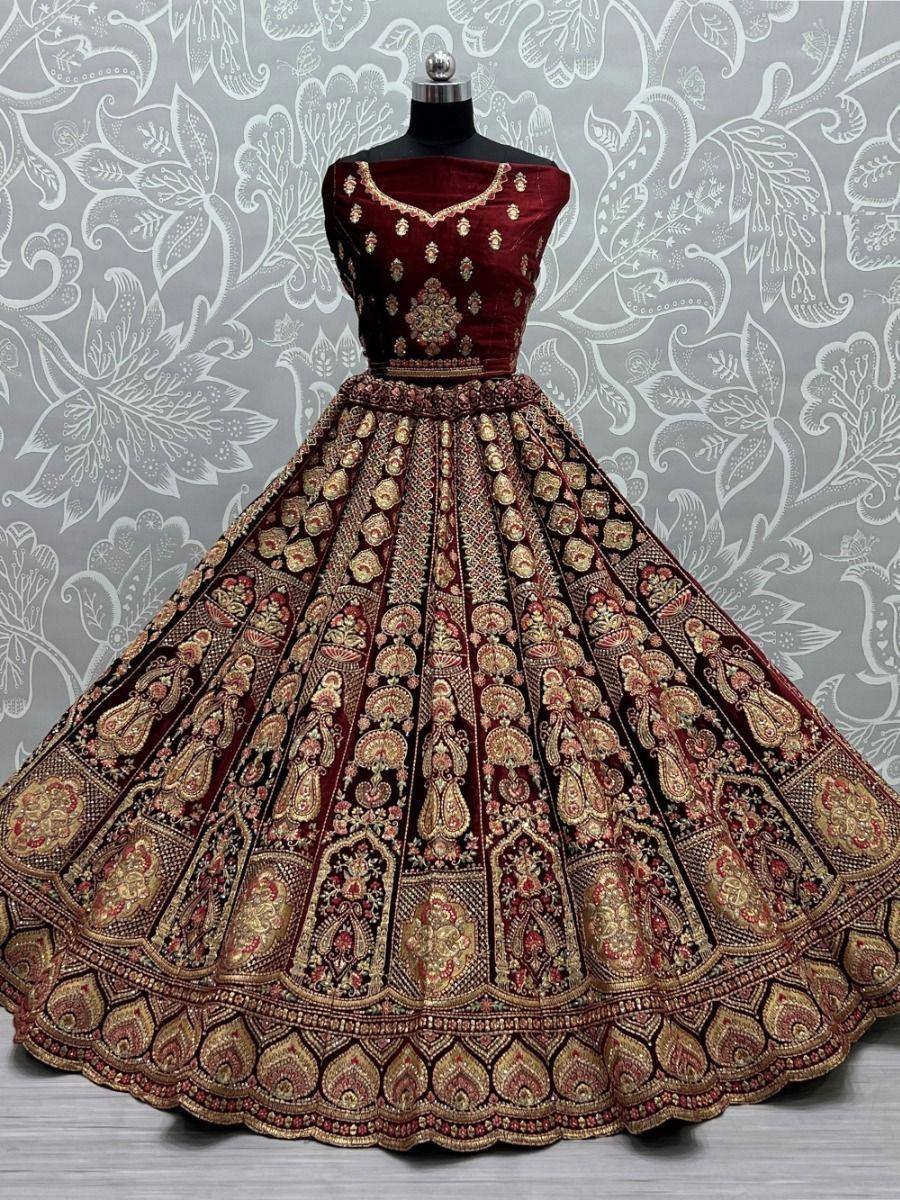 Maroon velvet lehenga choli with gold embroidery, designer Indian ethnic wear for weddings