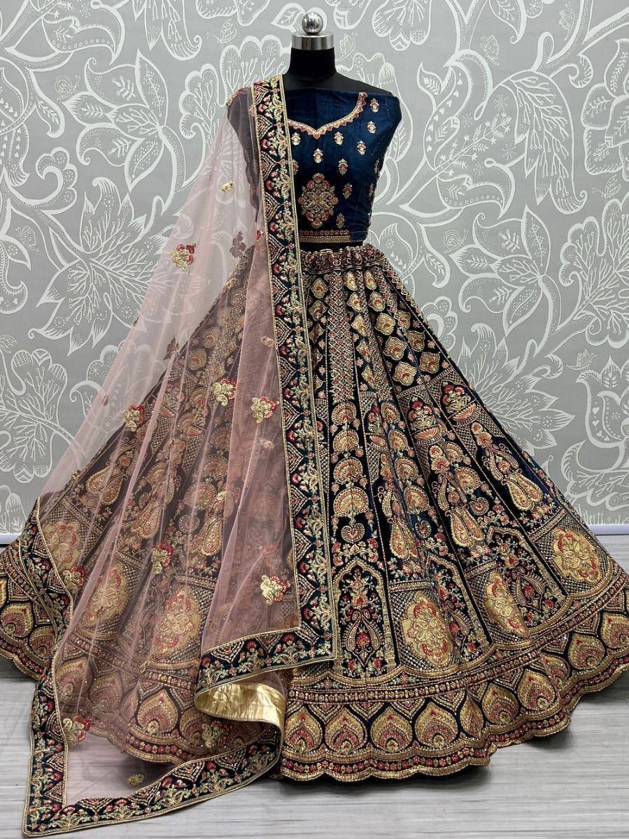 Designer navy blue lehenga choli with gold embroidery and sheer dupatta, ethnic Indian wedding wear