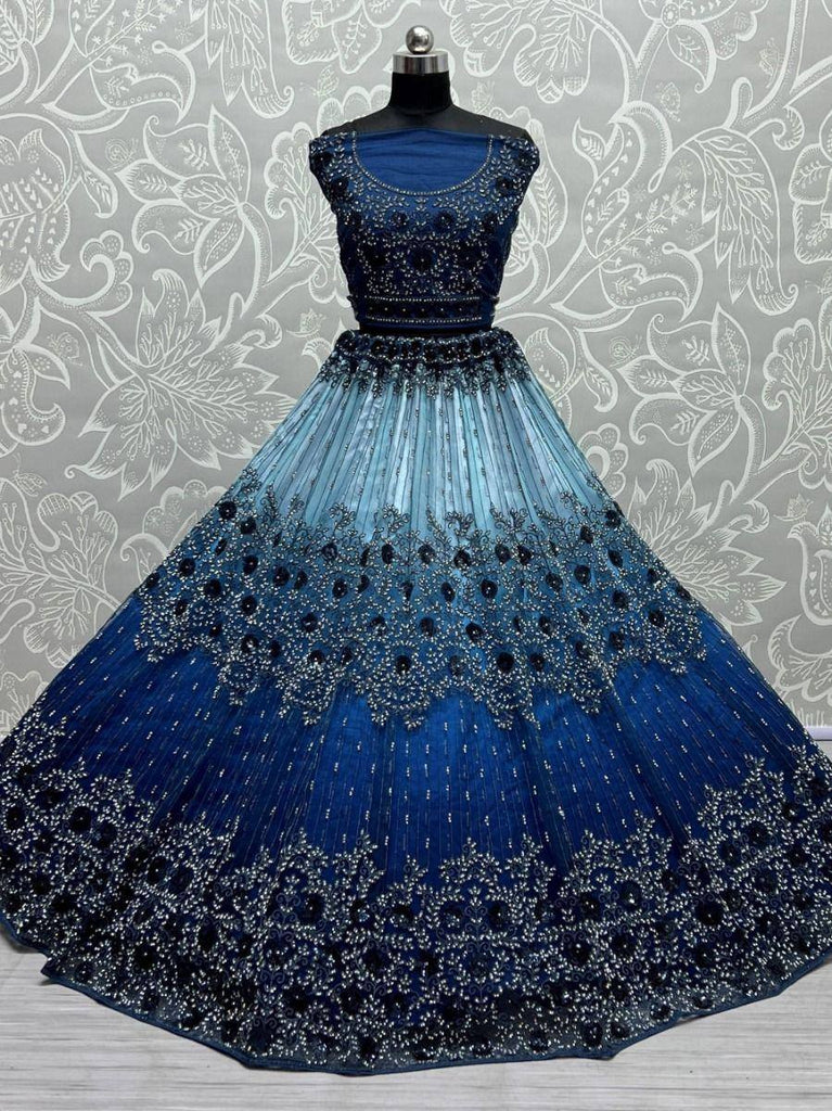 Blue ombre lehenga choli with heavy embroidery and beadwork, perfect for Indian ethnic wear events