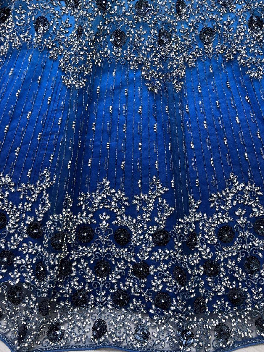 Royal blue ethnic gown with intricate silver beadwork and black sequin floral embroidery