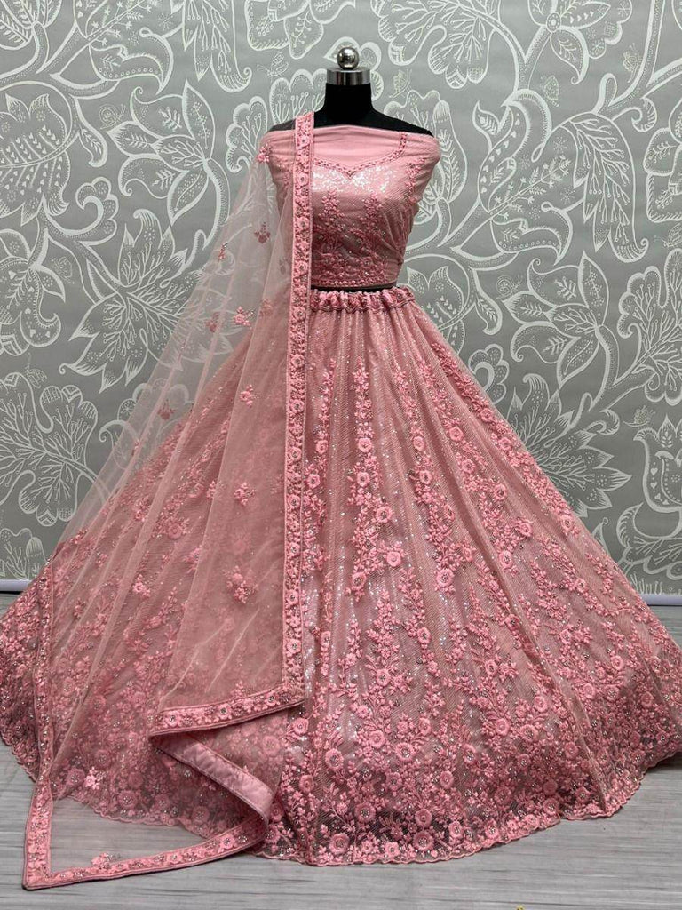 Beautiful Peach Zircon Diamond Work Net Lehenga Choli