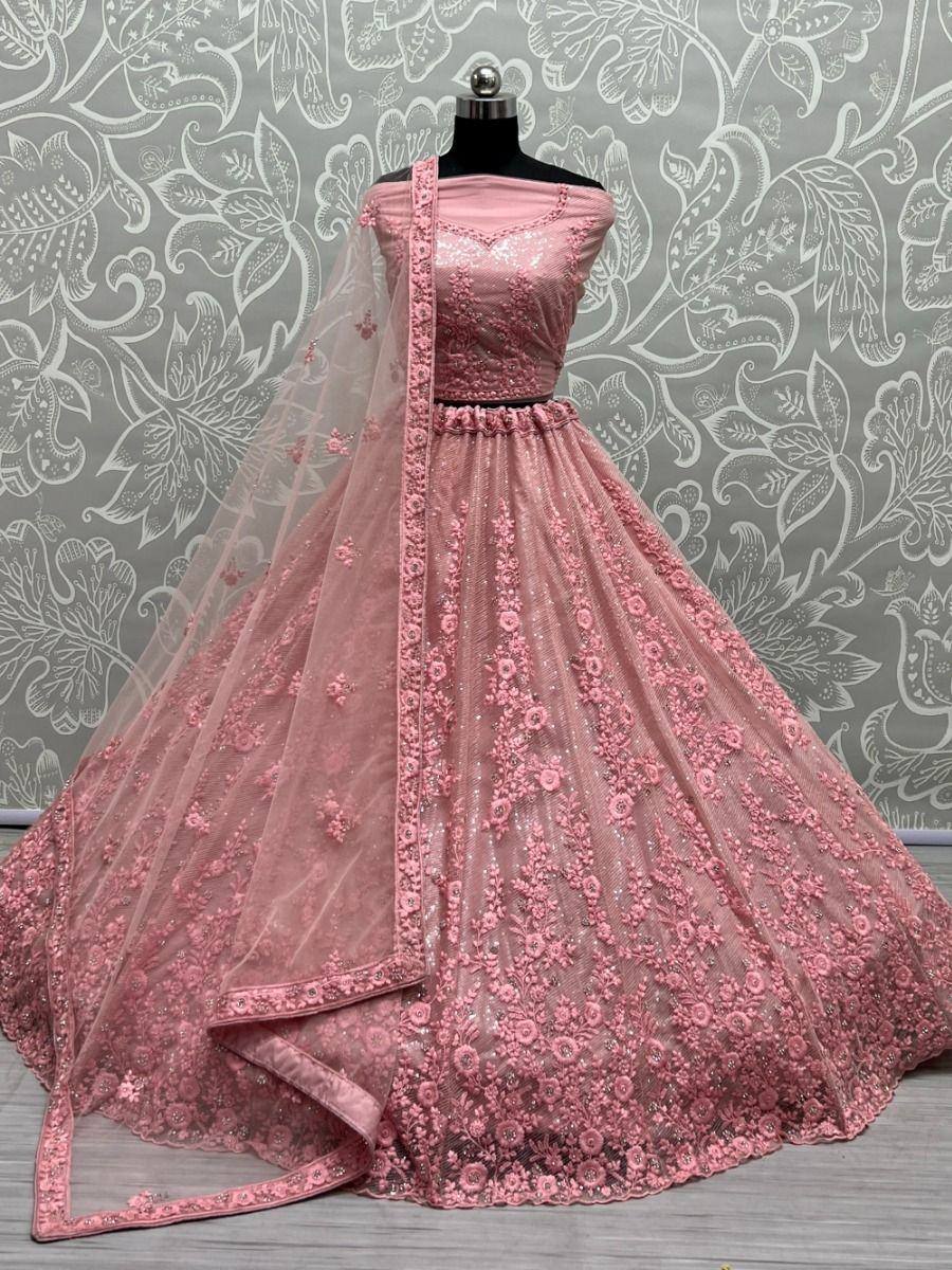 Pink designer lehenga choli with floral embroidery and net dupatta, ethnic wear for weddings