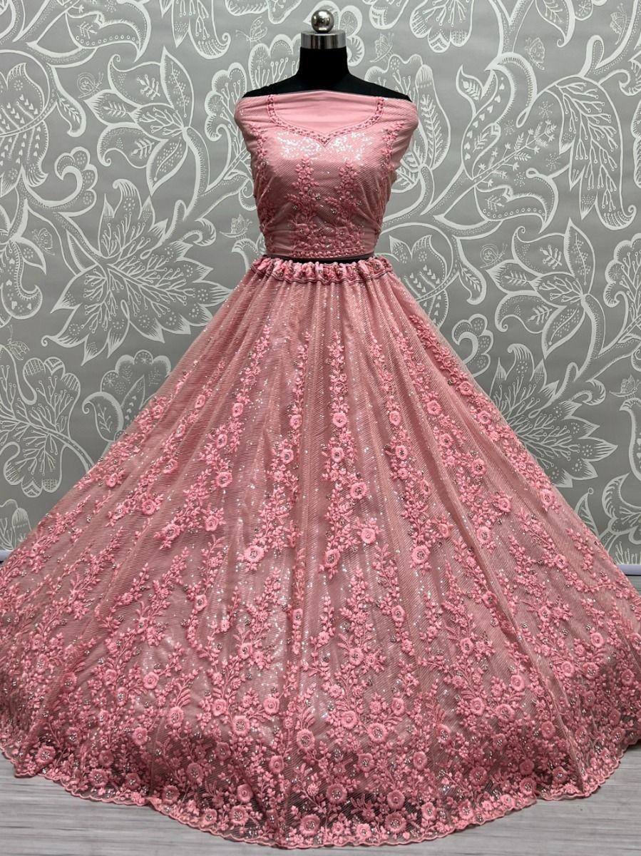 Pink embroidered lehenga choli with floral lace and sequins, perfect for Indian ethnic occasions