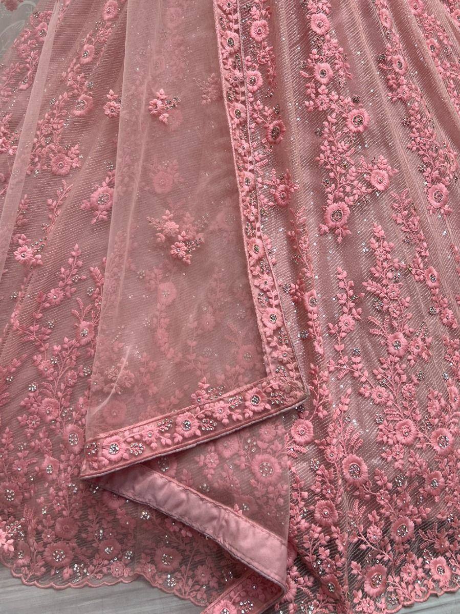 Pink floral embroidered lehenga with sequin detailing and sheer net fabric