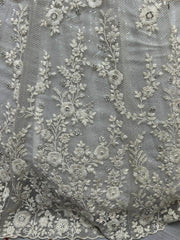 Ravishing Cream Zircon Diamond Work Net Lehenga Choli