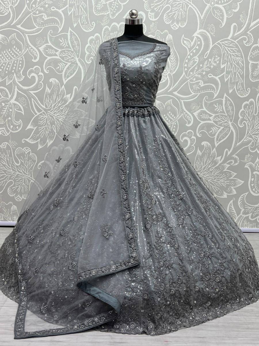 Grey embroidered lehenga choli with sequins and net dupatta, perfect for Indian weddings and parties.