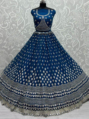 Stunning Blue Zircon Heavy Embroidered Net Lehenga Choli