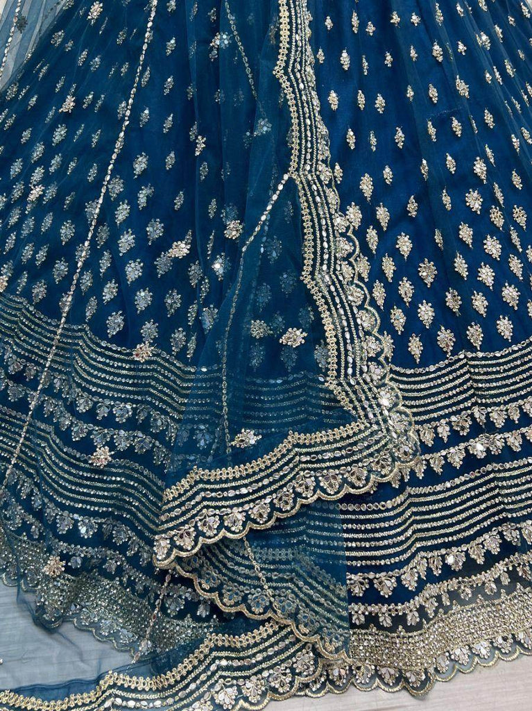 Stunning Blue Zircon Heavy Embroidered Net Lehenga Choli