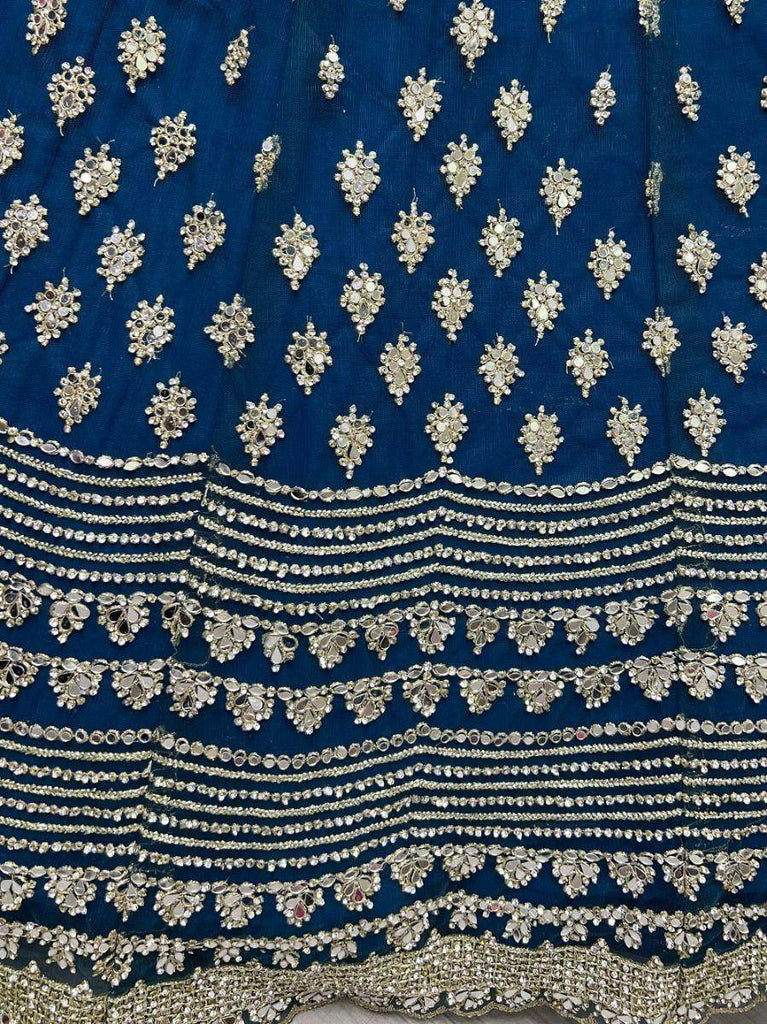 Stunning Blue Zircon Heavy Embroidered Net Lehenga Choli